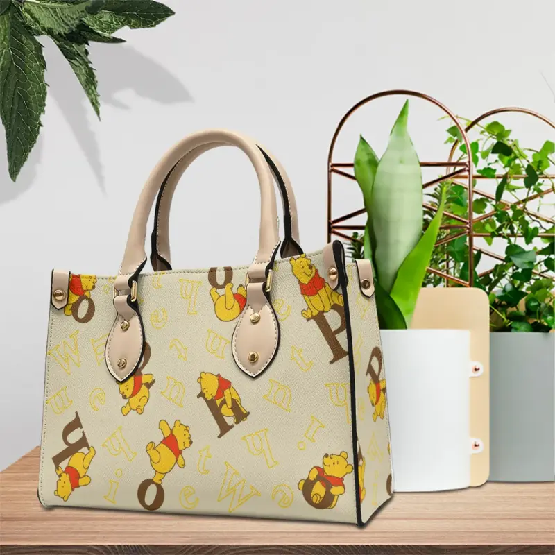Winnie-the-Pooh-100th-Anniversary-2026-LEATHER-HANDBAG-TMTHU8840-2.webp